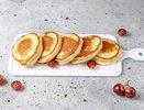 Пышные оладьи без дрожжей и миксера: почему кипяток и ленивое тесто работают лучше соды